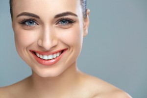 Woman smile. Teeth whitening. Dental care.